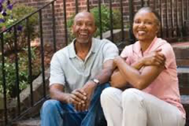 senior couple sitting on stairs senior couple sitting on stairs